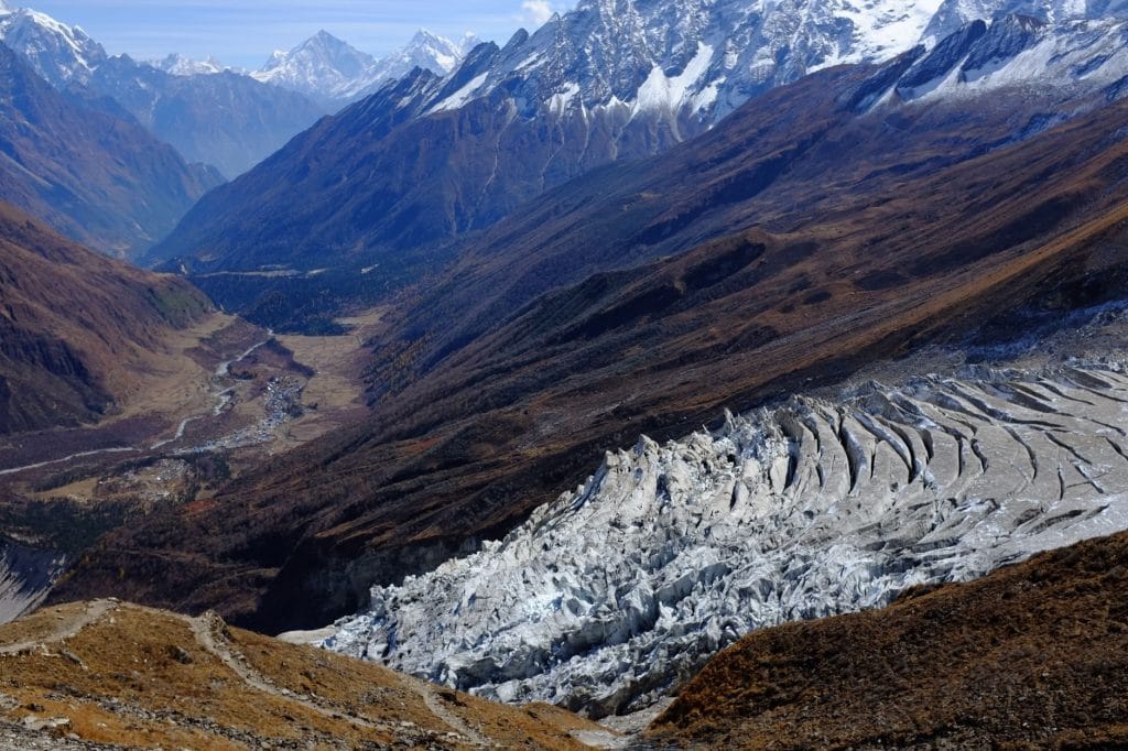 04_Stunning_view_of_a_Himalayan_glacier_surrounded_by_mountains_under_a_c