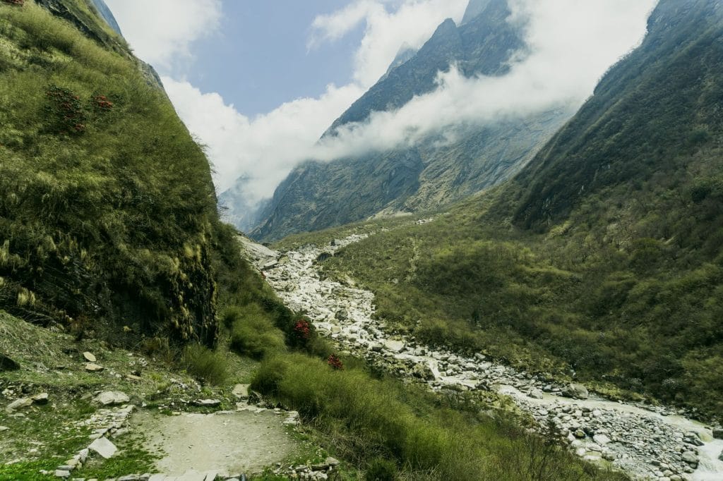 05_Breathtaking_view_of_Annapurna_s_lush_valley_with_rugged_mountains_and