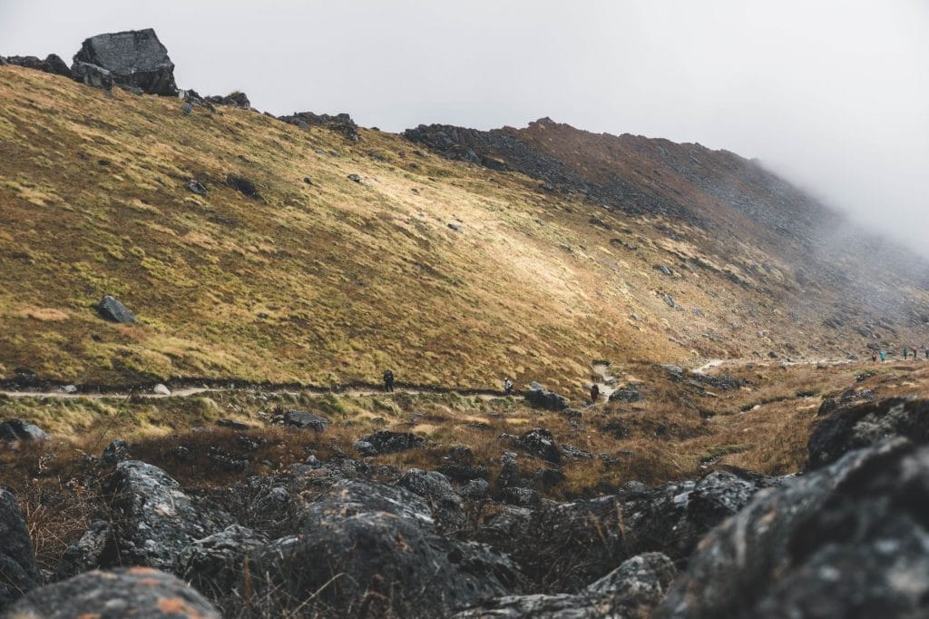 05_Foggy_mountain_landscape_with_a_rocky_trail_in_Annapurna_Nepal