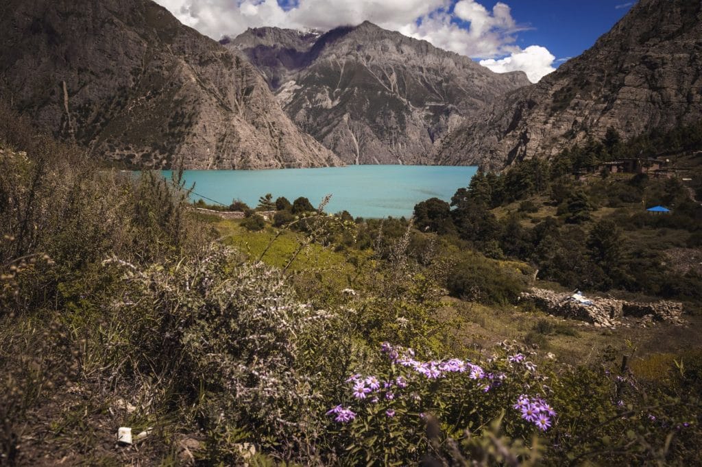 breathtaking-view-of-phoksundo-lake-surrounded-by-mountains-in-karnali.lower-dolpo-treklower-dolpo-trek
