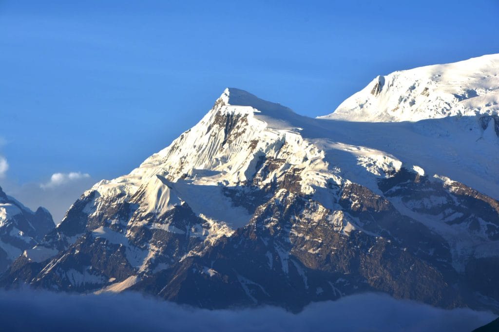 breathtaking-view-of-snow-covered-himalayan-peaks-at-sunrise-capturing.lower-dolpo-treklower-dolpo-trek